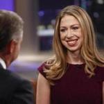 Chelsea Clinton with NBC host Brian Williams in 2011.