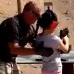 Shooting instructor Charles Vacca stood next to a 9-year-old girl at the Last Stop shooting range in White Hills, Arizona.