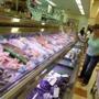 A customer looked at the seafood on display at the Market Basket in Burlington.