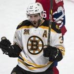 Patrice Bergeron was able to celebrate 30 goals and a Selke Trophy in 2013-14. AP Photo/The Canadian Press, Paul Chiasson