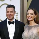 Actor Brad Pitt and actress Angelina Jolie arrive at the 86th Academy Awards in Hollywood, California in this March 2, 2014 file photo. Brad Pitt and Angelina Jolie, the glamorous Hollywood couple dubbed 