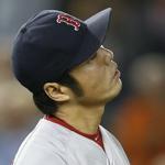 Koji Uehara gave up the tying and winning home runs to the Yankees in the ninth inning Thursday night. (AP Photo/Kathy Willens)