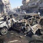 Cars were burned during a Syrian government airstrike in the northeastern city of Raqqa, Syria, on Saturday.