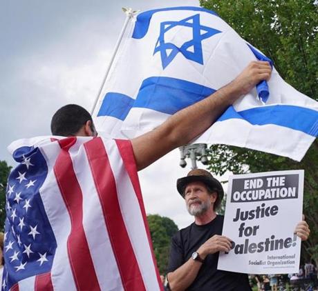 A supporter of Israel argued with a supporter of Palestine during a demonstration on Aug. 9 in Washington, D.C.
