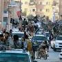 Islamic State fighters paraded in Raqqa, Syria.