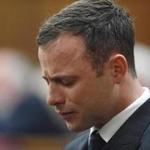 Track star Oscar Pistorius reacted in the dock as the verdict was read during his trial Thursday.