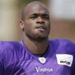 Vikings running back Adrian Peterson was booked and released on Saturday on a child abuse charge in Texas.