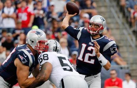 Tom Brady looked for a receiver on the Patriots? first possession.
