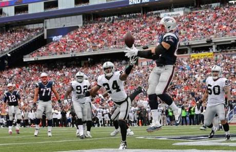 Rob Gronkowski dropped a pass as Charles Woodson defended in the fourth quarter.
