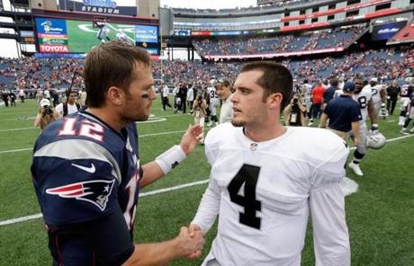 Tom Brady spoke with Derek Carr after the game.
