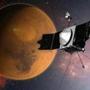 In this artist concept provided by NASA, the MAVEN spacecraft approaches Mars on a mission to study its upper atmosphere.  