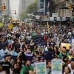 People marched during a rally against climate change in New York.