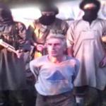 An online video showed the French captive pushed to the ground before he was killed by an Algerian splinter group.