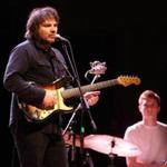 Jeff Tweedy of the band Wilco performs solo in concert with his son Spencer Tweedy at the Meyerhoff Symphony Hall on Monday, June 9, 2014, in Baltimore. (Photo by Owen Sweeney/Invision/AP) -- 07fallalbumspicks 