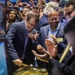Wayfair co-chairman and co-founder Steve Conine rang a ceremonial bell in front of fellow co-chairman and co-founder Niraj Shah to mark the company's IPO on the floor of the New York Stock Exchange.