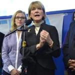 Martha Coakley decried the ad Thursday as she stood next to Deborah Eappen, mother of an infant who died in 1997 while in the care of his nanny.  