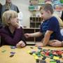 Martha Coakley, a candidate for governor, talked to Cody about toys at a Quincy early childhood education center. 