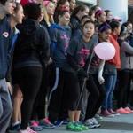 Simmons College students gathered for a group photo before the Making Strides Against Breast Cancer Walk.