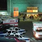 Boston- 11/30/95 - Police cars and ambulances jam Mass. General Hospital where shot cop, Jonathan Stratton was taken. Staff photo by Mark Wilson.