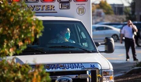 An ambulance left a parking lot in Braintree near where a suspected case of Ebola was reported on Sunday.
