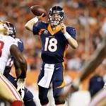 Broncos quarterback Peyton Manning threw for four touchdowns against the 49ers on Sunday night. (AP Photo/Joe Mahoney) 