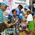 Nigeria?s minister of water resources, Sarah Ochekpe, washed schoolchildren?s hands as part of anti-Ebola effort.