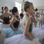 Shelby Elsbree (front) and other ballerinas await rehearsal for ?Swan Lake.?