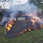 The lava flow from the Kilauea Volcano burned vegetation as it approached a property boundary near the village of Pahoa, Hawaii.
