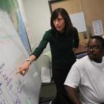 Dr. Sara Stulac of Partners in Health discussed the Ebola crisis Tuesday with Mohamed Mailor Barrie of Wellbody Alliance.