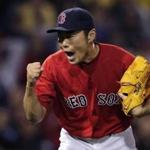 Boston Red Sox relief pitcher Koji Uehara pumps his fist after getting Tampa Bay Rays' Desmond Jennings to ground out to end the top of the ninth inning of a baseball game at Fenway Park in Boston, Friday, May 30, 2014. (AP Photo/Charles Krupa)