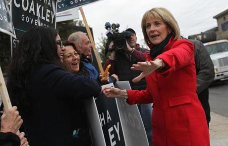 Coakley greeted supporters outside of the station.
