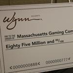 Wynn Resorts executive Robert DeSalvio accepted the license for Wynn, and presented the commission with a ceremonial, oversized check for $85 million, the state fee for the resort casino license.