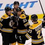 The Bruins celebrated after scoring a goal during the third period.