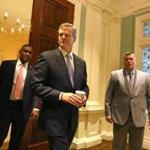 Governor-elect Charlie Baker arrived at the State House Wednesday to meet with Governor Deval Patrick. 