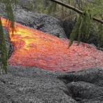 A photo from Sunday shows the lava approaching a steel power pole near the town of Pahoa on the Big Island of Hawaii. 