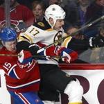 Montreal Canadiens right wing P.A. Parenteau took an elbow to the head from Milan Lucic. 
