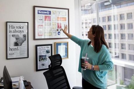 Tracy Spicer pointed out mementos from her time working for Senator Edward Kennedy in her Washington office. Spicer now works at Avenue Solutions, a lobbying firm where she is a founding partner. 
