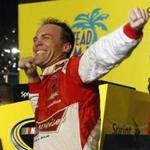 Kevin Harvick celebrates winning the NASCAR Sprint Cup championship Sunday in Homestead, Fla. (Terry Renna/Associated Press)