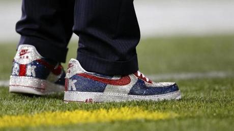 Pats owner Robert Kraft sported sequined Nikes with his customary pinstripes.
