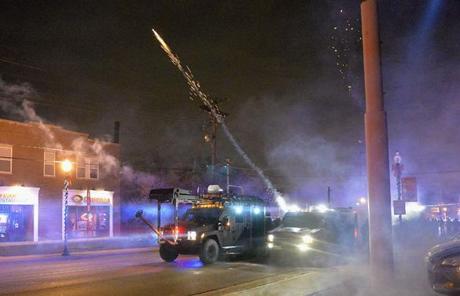 Police fired canisters of tear gas as demonstrators gathered in Ferguson.
