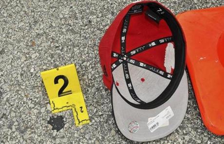 An evidence photograph released by the St. Louis County prosecutors office showed Michael Brown's hat after the shooting.
