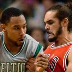Jared Sullinger, decked out in the Celtics? new alternate unifrom, drives against Chicago?s Joakim Noah EPA/CJ GUNTHER CORBIS OUT