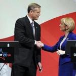 Charlie Baker and Martha Coakley shook hands before their debate in Worcester. Outside groups spent millions of dollars in the gubernatorial campaign.