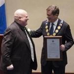 Toronto's new Mayor John Tory, right, recognized former mayor Rob Ford, who won a seat on the city council.
