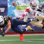 Foxborough-12/06/14- High School Superbowls- Everett vs Xaverian-- Xaverian's number 45, Kenny Kern catches a long pass and dives in the end zone for a 1st qtr td as he is defended by Everett's Derelle Felix. Boston Globe staff Photo by John Tlumacki(sports)