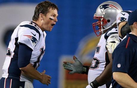 Tom Brady celebrated with Vince Wilfork after the N.E. defense stopped the Chargers for the final time.
