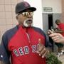Boston Red Sox special assignment instructor Luis Tiant speaks with reporters outside the club house at the teams baseball spring training facility, in Fort Myers, Fla., Tuesday, Feb. 19, 2008. Tiant left Cuba in 1961 following the Bay of Pigs invasion to play for a Mexican baseball team. (AP Photo/Steven Senne) -- Library Tag 02232008 Sports