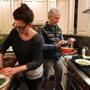 Instagram aficionados Linda and Jonathan Plazonja making dinner ? and photographing it ? in their Brookline kitchen. 
