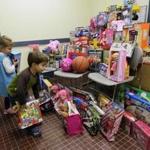 Three-year-old twins from Rowley donated toys to the Danvers Police Department last year. 