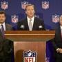 NFL commissioner Roger Goodell, center, announced new measures for the league's personal conduct policy on Dec. 10.  